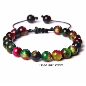 Detail showing 8mm colorful tiger eye beads on an adjustable black woven cord bracelet