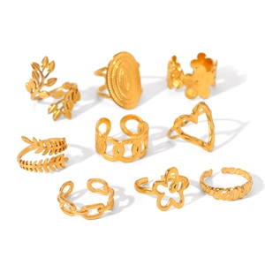 9pcs set of gold-plated stainless steel rings with floral, leaf and heart motifs