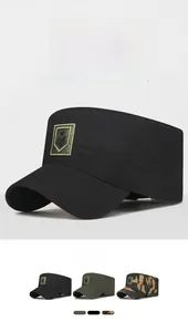 Detail showing various colors of men's camouflage military caps with embroidered patches