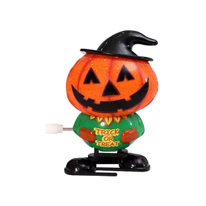 Wind-up Halloween pumpkin toy in orange and green with Trick or Treat text