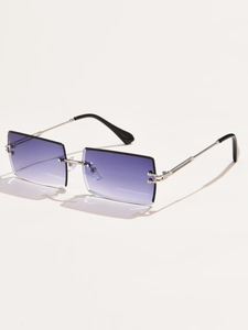 Detail view of rimless rectangle sunglasses featuring purple gradient lenses and silver arms