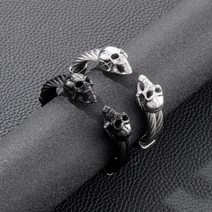 Punk style double skull stainless steel cable bangle in silver and black colors
