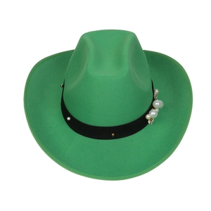 Detail of green felt cowboy hat featuring a black ribbon band and elegant pearl decorations
