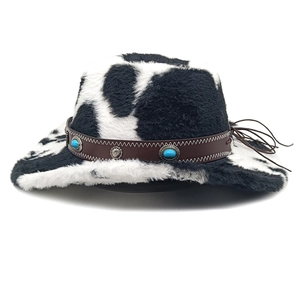Detail of cow print plush cowboy hat with turquoise beads and brown leather strap