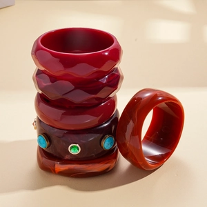 Retro resin geometric faceted bangles set in deep red and amber tones with stones