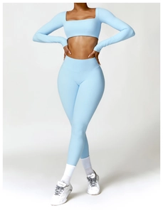 Detailed view of light blue square neck long sleeve crop top and high waist yoga leggings