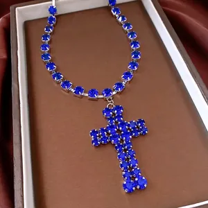 Silver cross necklace with deep blue crystals on a premium tennis chain base