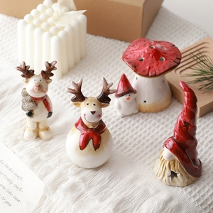 Vintage Christmas ceramic reindeer and Santa figurines with warm led lighting decorations