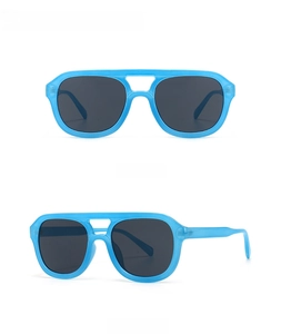 Front and 45-degree side views of modern flat top sunglasses in translucent blue