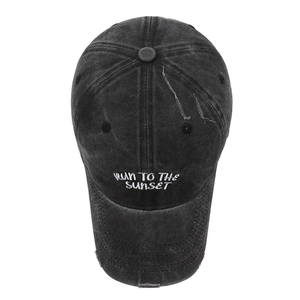 Vintage washed denim baseball cap with Run To The Sunset embroidery and distressed details