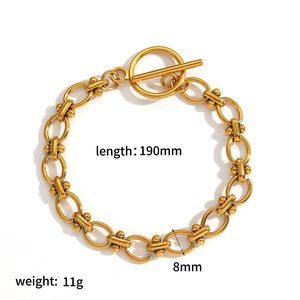 Macro shot of 18k gold plated 304 stainless steel chain bracelet with OT toggle clasp