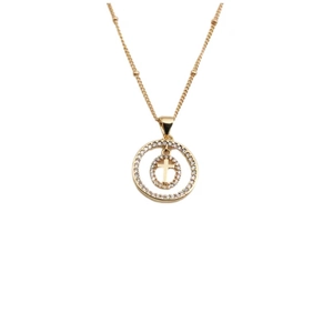 Élégant collier en cuivre plaqué or avec pendentif croix et pierres de zircon