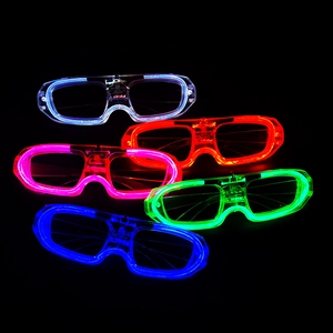 Five colorful LED shutter glasses glowing in blue red pink and green on black background