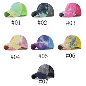 Set of seven tie-dye mesh trucker hats in various vibrant colors and breathable designs