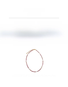Macro detail of freshwater pearl necklace with rhodochrosite beads and titanium steel chain