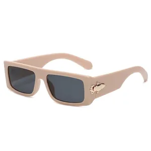 Retro rectangle beige sunglasses with thick frames and golden hinge detail for women