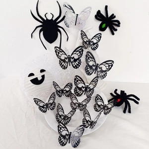 Detail view of 3D skeleton rose butterfly and spider stickers for Halloween decor