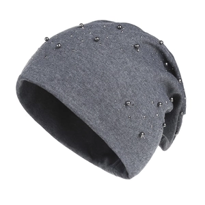 Dark grey knitted beanie for women featuring silver pearl embellishments on a plain background