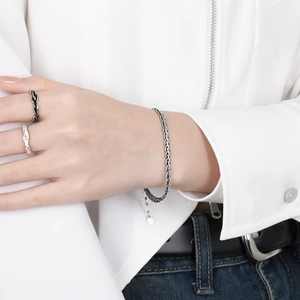 Woven S925 sterling silver snake bone bracelet and ring set with minimalist texture