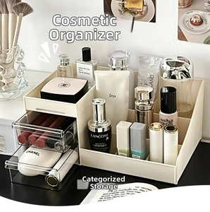 Detail of cream desktop organizer showing clear drawers and multi-grid storage slots