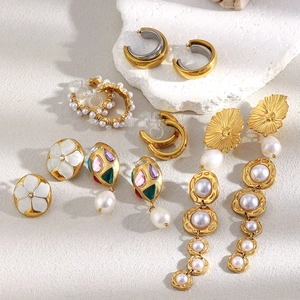 Collection of 18K gold plated earrings with pearls, zircons and floral enamel details
