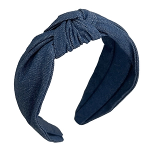 Vintage blue denim knotted headband featuring a wide brim for a stylish high skull top look