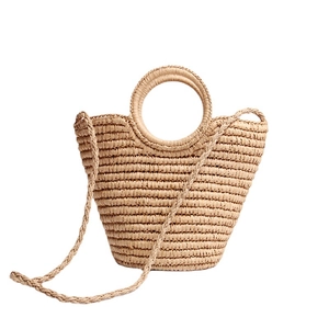 Vintage beige handmade woven straw tote bag with round handles and woven shoulder strap