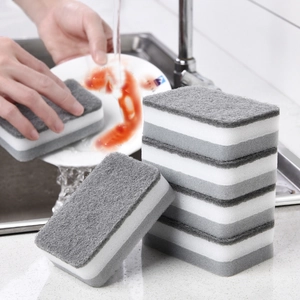 Dual-sided cleaning sponge with multi-layer structure used in kitchen sink scene