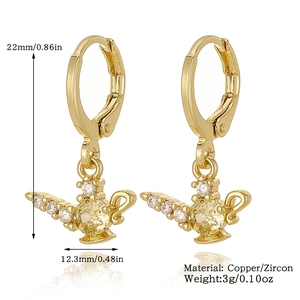 Detail view of gold Aladdin lamp earrings with yellow zircon, 22mm size and 3g weight