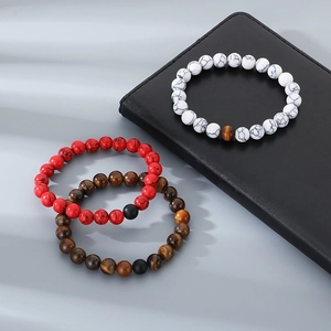 Detailed macro view of elastic bead bracelets with natural stones and shadow lighting