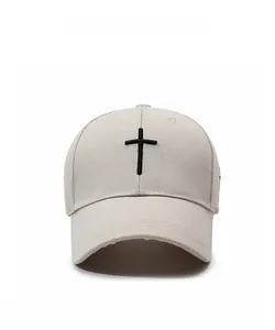 Front view of beige baseball cap with black cross embroidery on high quality cotton fabric