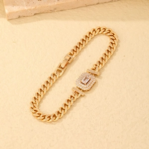Gold plated Cuban link bracelet featuring a rectangular cubic zirconia center pendant