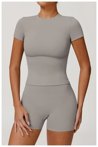 Close-up of grey high-waist yoga shorts with seamless elastic brushed fabric texture