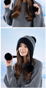 Detailed knit texture and plush pom-poms on women's winter Fair Isle earflap hat