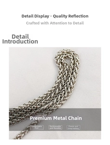 Detailed view of silver braided metal chain strap and quality hardware on bucket bag