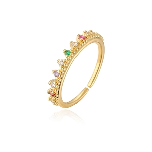 Macro shot of 18K gold plated crown ring with colorful cubic zirconia and adjustable band