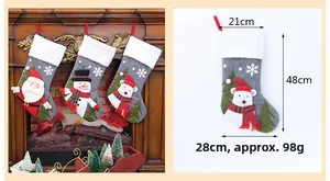 Detailed view of Christmas stockings featuring Santa and snowman with size dimensions