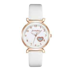 Women's quartz watch with white leather strap and rose gold heart cutout on the dial