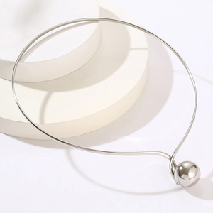 Minimalist silver stainless steel choker necklace featuring a polished spherical ball pendant