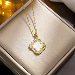 Titanium steel four-leaf clover necklace with white shell inlay and zircon halo