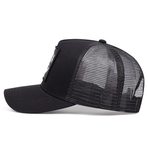 Classic black trucker hat with devil embroidery and breathable mesh for street style
