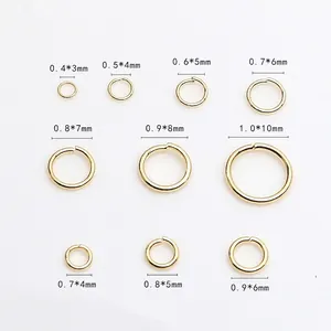 Macro view of gold plated open jump rings in various sizes from 3mm to 10mm for DIY jewelry