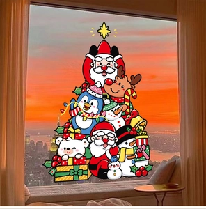 Detail of colorful Santa and reindeer window decals on a sunset glass background