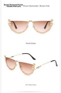 Detail of rimless cat eye sunglasses with brown diamonds and brown pink gradient lenses