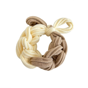 Chunky woven elastic hair tie in beige and light brown plush knit fabric for ponytails