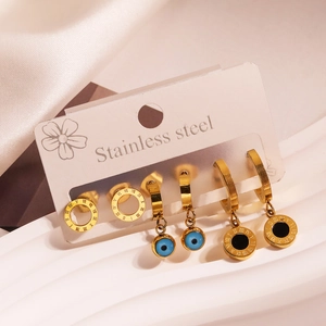 Detailed set of three gold stainless steel earrings featuring Roman numerals and evil eye charm
