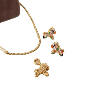 Gold plated pearl necklace and horse pendants set with colorful cubic zirconia stones