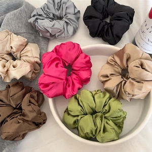 7-piece set of silk satin scrunchies in gray, black, beige, and assorted colors