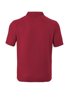 Detail showing the burgundy polo shirt with a sophisticated herringbone textured knit