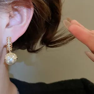 French vintage gold plated pearl drop earrings with sparkling zircon lace details